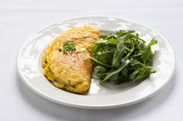 Omelette au fromage, which will be cooked runny in the centre on request.