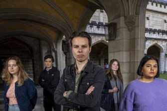 Melbourne University student union president Jack Buksh (centre) says a $7m federal grant would be better spent on staff or subjects.