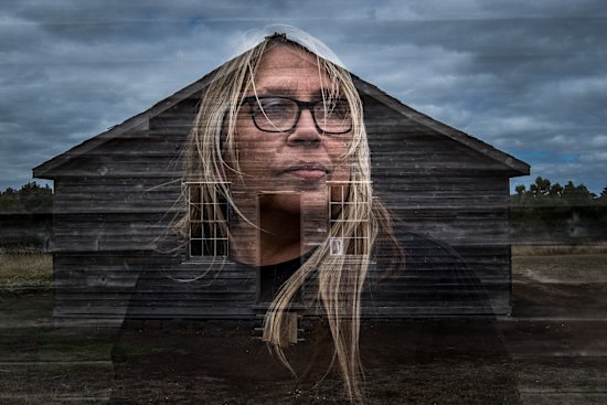 Gunditjmara elder Aunty Donna Wright and the old dormitory at Lake Condah Mission.  