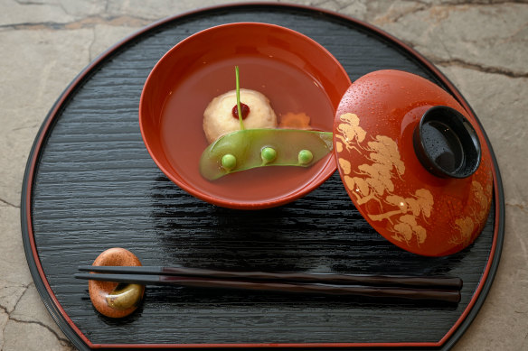 Clear soup with a sweet scallop ball and sour plum paste.