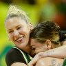 Lauren Jackson hugs Opals teammate Cayla George at the Olympics qualifying event in Brazil.