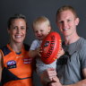 Brid Stack with her husband, Cárthach, and son, Cárthach Óg. The Irishwoman is back in the AFLW after her debut season ended before it began with a traumatic neck injury.