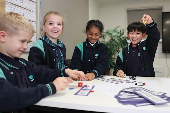 Maramba Primary School Grade One students Quinn, Cara, Maya and Mason trialling a numeracy check for Grade One students that is due to be rolled out to every primary school from 2027.