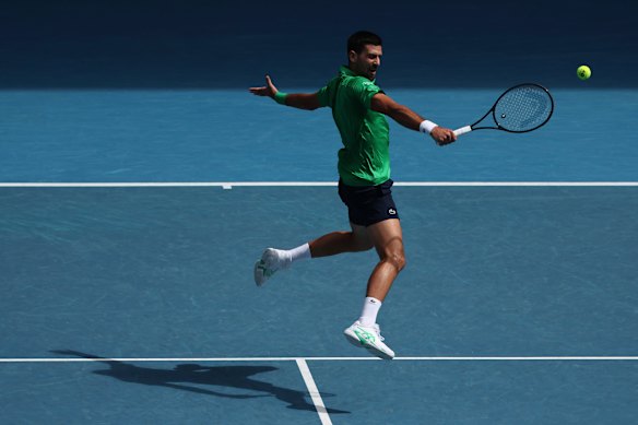 Novak Djokovic in action against Lorenzo Musetti at Rod Laver Arena on day 11 of the Australian Open.