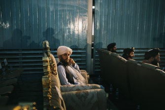 A Taliban official attends a ceremony for the reopening of the schools at the Amani high school. 