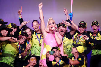 Katy Perry with the triumphant Australian team after they won the T20 World Cup final at the MCG.