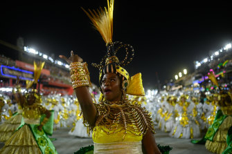 Members of Imperatriz Leopoldinense Samba School perform at the Marques de Sapucai Sambadrome during Carnival 2022 in Rio de Janeiro, Brazil.