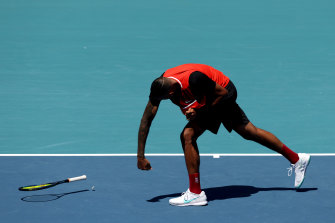 Nick Kyrgios throws his racquet during his loss to Jannik Sinner in Miami earlier this year.
