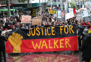 A Melbourne protest over the death of Kumanjayi Walker on November 13, 2019 - the same day Constable Zach Rolfe was charged with murder.