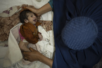 Sofia cradles her two-month-old, Abdul, as he undergoes treatment for malnutrition at a hospital in Kabul, Afghanistan, in October.