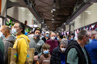 Melburnians wear face masks at the Queen Victoria Market.