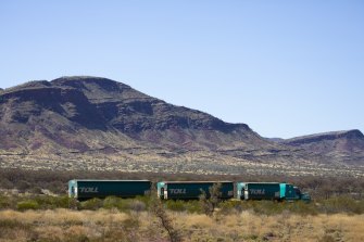 A road train on the outskirts of Karijini National Park near Tom Price in the Pilbara region of Western Australia. Miner Rio Tinto will help coordinate some COVID-19 vaccination clinics in the region this month.