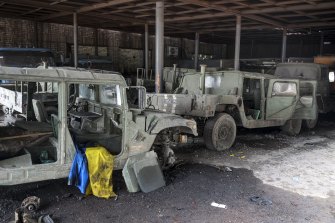 Damaged Ukrainian army military vehicles in an area controlled by Russian-backed separatist forces in Mariupol.