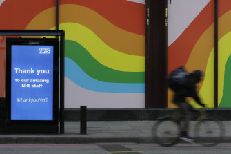 An ad thanks the work of the British National Health Service staff during the coronavirus outbreak outside London's Harrods department store.