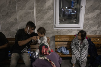 Afghan migrants rescued by the Turkish coast guard in the Aegean Sea rest in Dikili, Turkey.