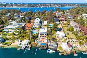 The $20 million Burraneer trophy home is one of the few locally set on a street-to-waterfront parcel.