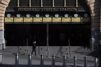 Flinders Street Station in Melbourne. The OECD says the Victorian lockdown has forced it to downgrade its forecasts for the Australian economy in 2021.