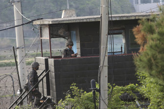 Soldiers walk up the stairs of their military guard post in Paju, South Korea, near the border with North Korea, on Sunday. The relationship between the two countries appears to be on the rocks again.