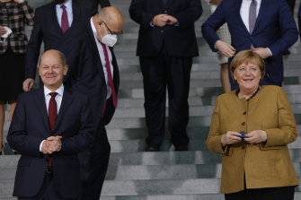Olaf Scholz and Angela Merkel, after Merkel’s last cabinet meeting on Wednesday.