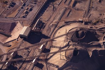 Iron ore stockpiles at BHP in Western Australia