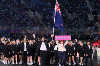 Tom Walsh, Flag Bearer of Team New Zealand leads their team out during the Opening Ceremony of the Birmingham 2022 Commo<em></em>nwealth Games.