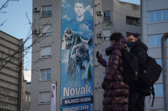 A billboard depicting Serbian tennis player Novak Djokovic on a building in Belgrade.
