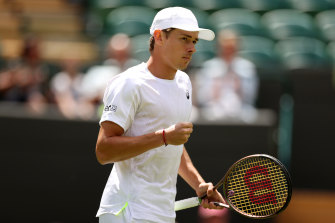 Alex De Minaur is safely through to the second round of a Wimbledon men’s draw which is rapidly opening up.