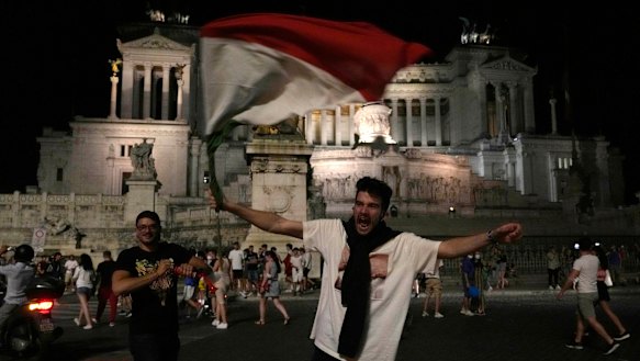 Italian fans celebrate in downtown Rome at the end of the Euro 2020 quarter-final between Belgium and Italy.