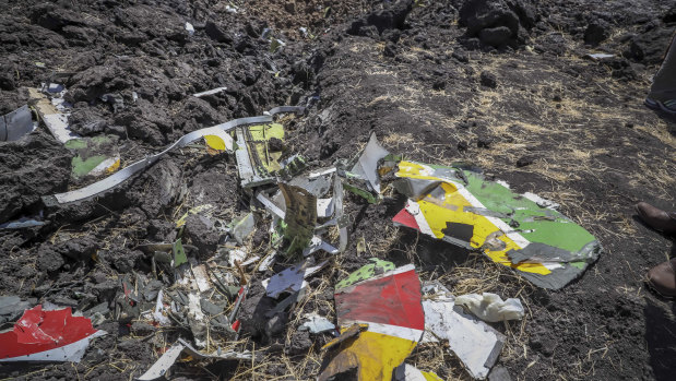 Wreckage lies at the site where an Ethiopian Airlines flight crashed shortly after take-off from Ethiopia's capital, Addis Ababa, killing all 157 on board.