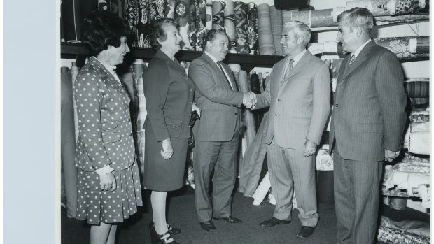 Joan Waldren, Mary Cusack, Jim Pead, John Cusack and  David Cusack in the Cusacks Furniture Store in Kingston after the store was rebuilt following a fire in 1976.