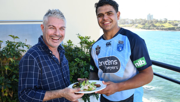Breakfast of champions: Chef Justin Bull with Blues star Latrell Mitchell.