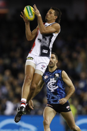 Rising star: Ben Long takes a grab for the Saints.