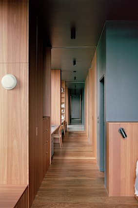 Large sliding timber doors allow the bedrooms to feel more spacious when the doors are open.