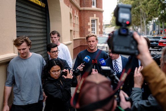Jordon (left), Blakey (rear, second from left) and Heeney (centre) arrive at Moore Park for their exit interviews from the Swans’ 2026 season.