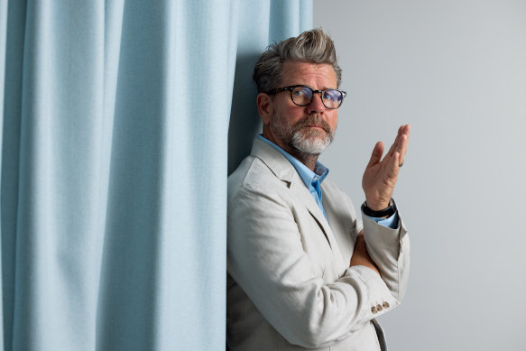 Tim Ross loves his suits that were designed by his wife, Michelle Glew-Ross. 