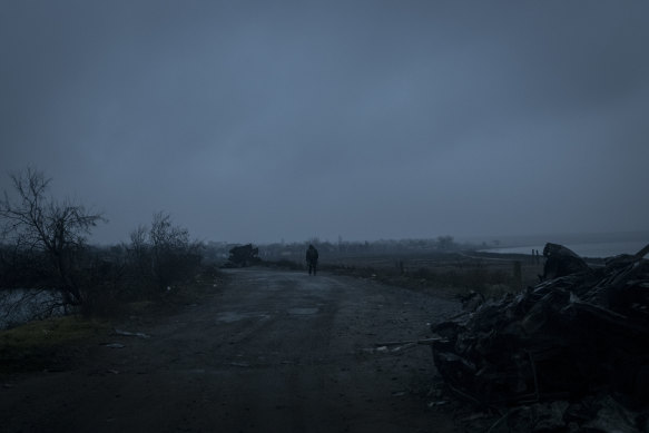 Destroyed civilian and military vehicles on a road leading out of the heavily destroyed village of Oleksandrivka, Ukraine, on Thursday, January 26, 2023. 