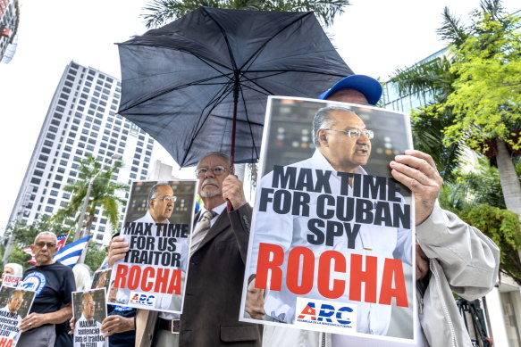 Members of the Assembly of the Cuban Resistance hold a rally demanding the “maximum sentence” for former US diplomat and alleged Cuban spy, Manuel Rocha, in front of the court in Miami, Florida, on April 9.