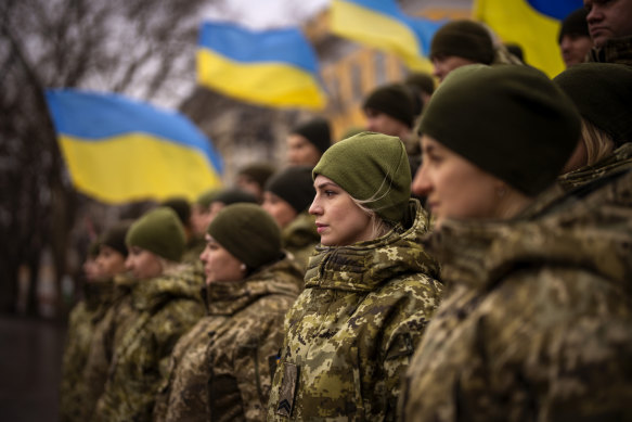 Ukrainian Army soldiers pose for a photo as they gather to celebrate a Day of Unity in Odessa, Ukraine on February 16.