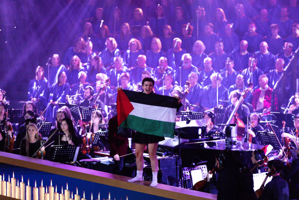 A Pro-Palestinian protester interrupts the Carols by Candlelight concert in Melbourne on Sunday.