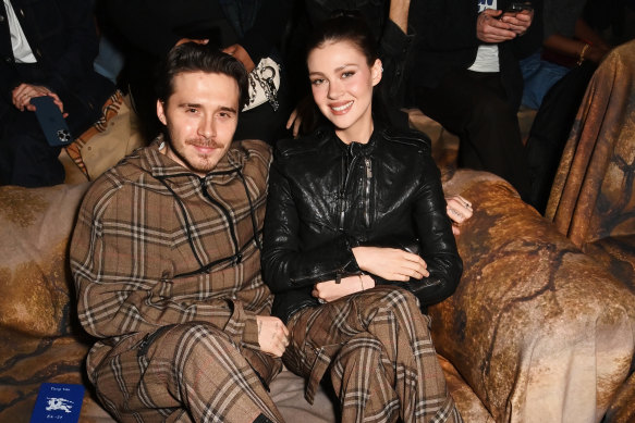 Brooklyn Beckham and Nicola Peltz at the Burberry winter 2025 show at the Tate Britain.