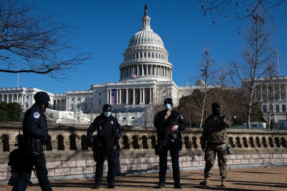 US Capitol police officers stand guard  in Washington DC following the riot.