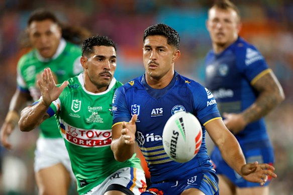 Eels No.6 Dylan Brown passes against Canberra. 