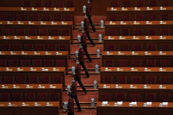 Tea hostesses prepare for the National Committee of the Chinese People’s Political Consultative Conference (CPPCC), an advisory body meeting in parallel with the National People’s Congress on Friday.