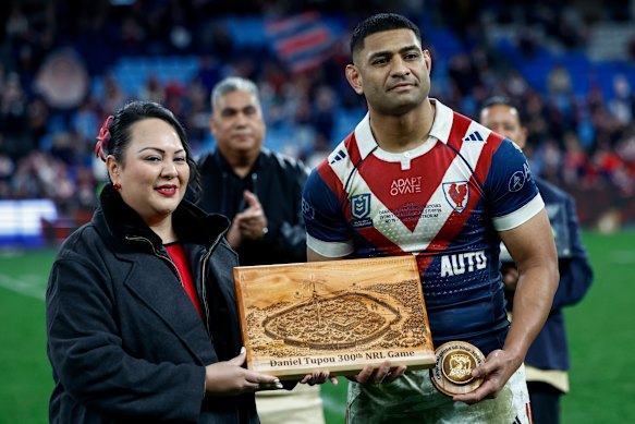Princess Lātūfuipeka Tukuʻaho of Tonga with Roosters winger Daniel Tupou on Saturday night.