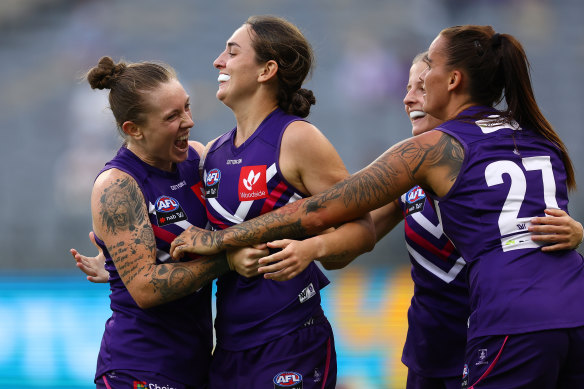 Maggie MacLachlan celebrates a goal. 