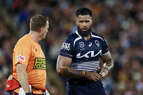 Payne Haas leaves the field injured.