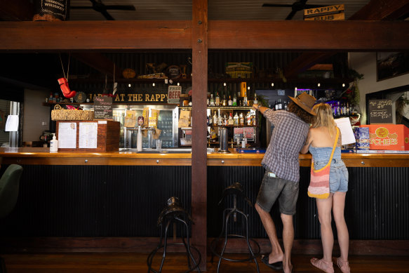 Locals line up for last drinks at the Commercial Hotel in Rappville.