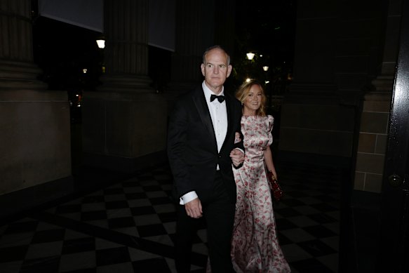 Australian News Corp chief Michael Miller arrives with his wife Tonya.