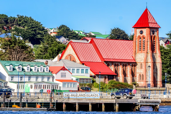 White clapboard houses with bright roofs will remind you of Norway.
