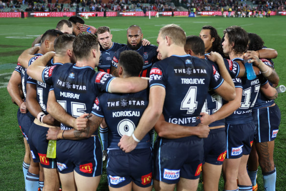 NSW players rally after their game one defeat in Adelaide.